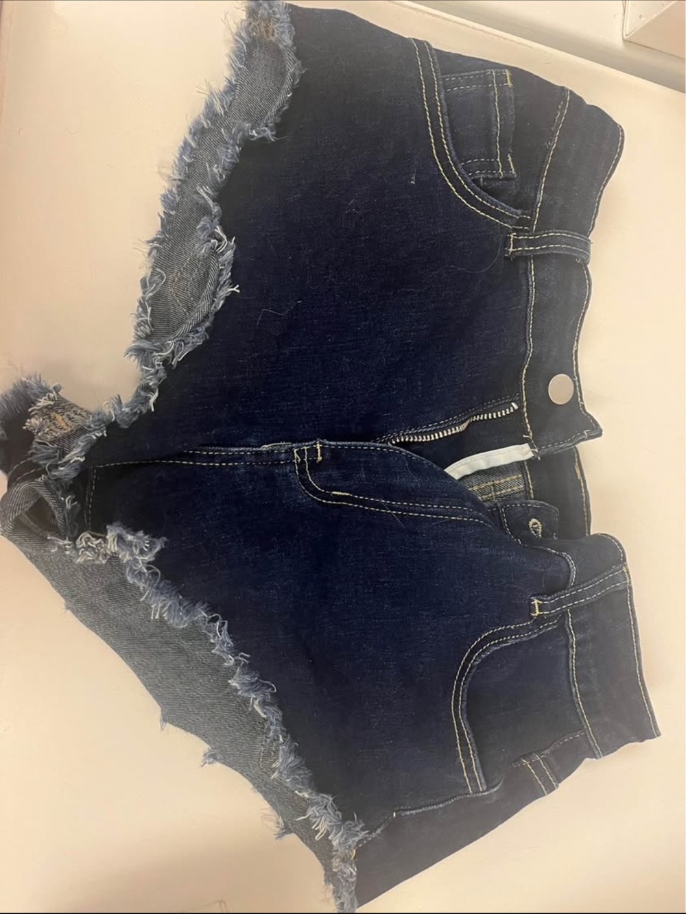 High-Rise Dark Indigo Frayed Denim Shorts - Women